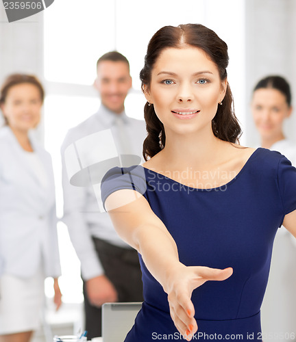 Image of woman with an open hand ready for handshake