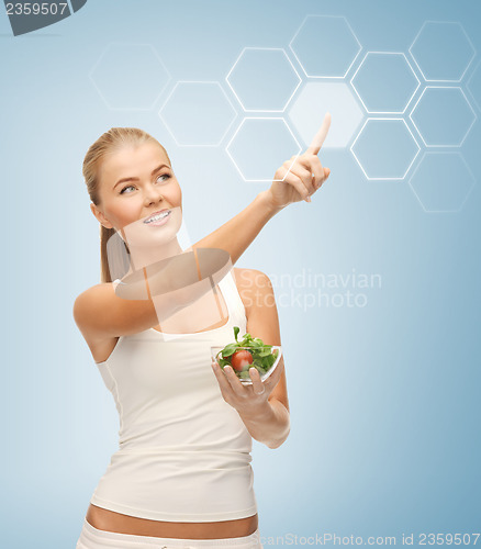 Image of woman with salad and virtual screen