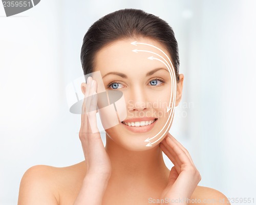 Image of face and hands of beautiful woman