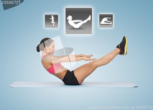 Image of woman doing exercises with virtual application