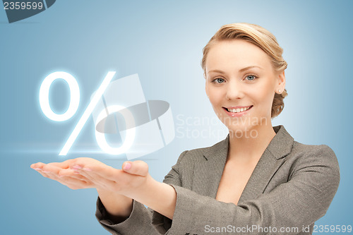 Image of woman showing sign of percent in her hands