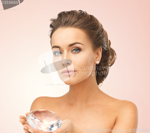 Image of woman showing big diamond