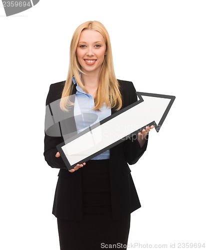 Image of smiling businesswoman with direction arrow sign