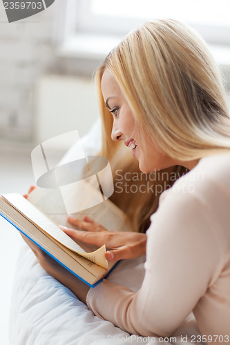 Image of woman reading book