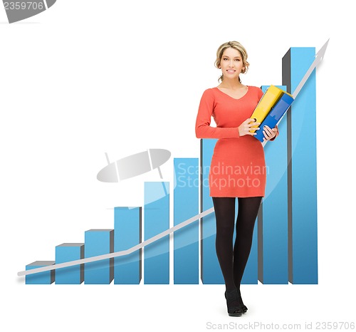 Image of businesswoman with big 3d chart and folders