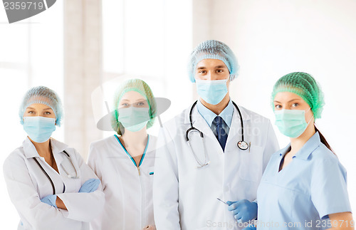 Image of group of doctors in operating room