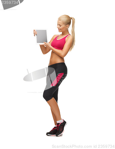 Image of sporty woman with tablet pc