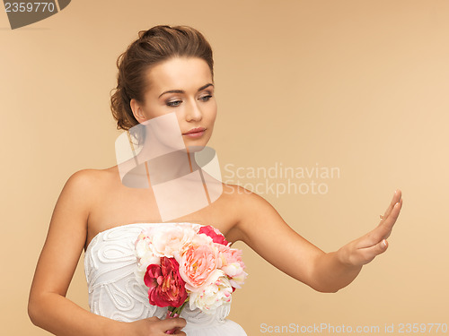 Image of bride with wedding ring