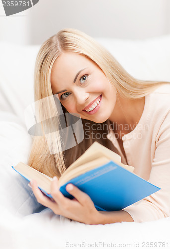 Image of woman reading book