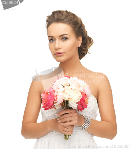 Image of woman with bouquet of flowers