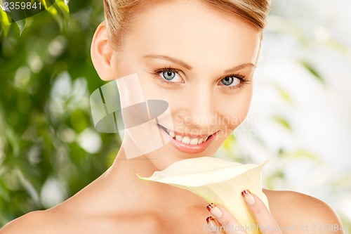 Image of beautiful woman with calla flower