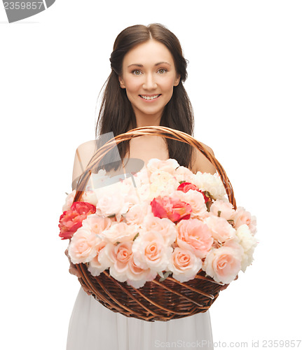 Image of woman with basket full of flowers