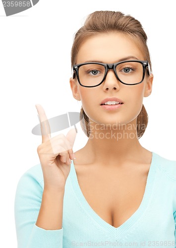 Image of woman in glasses with finger up