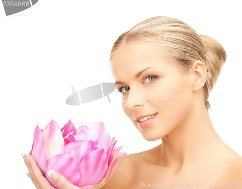 Image of lovely woman with lotos flower