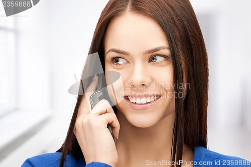 Image of businesswoman with cell phone