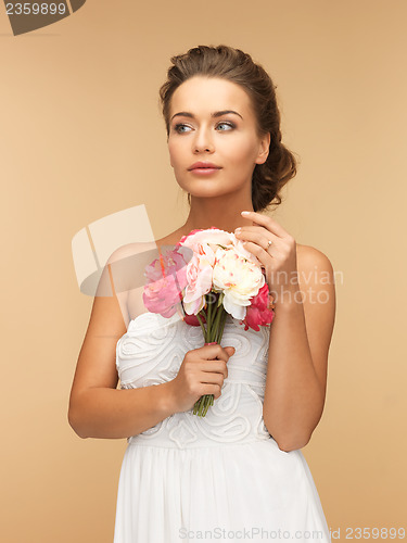 Image of woman with bouquet of flowers