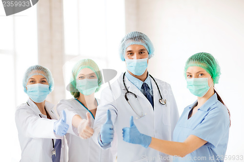 Image of group of doctors in operating room