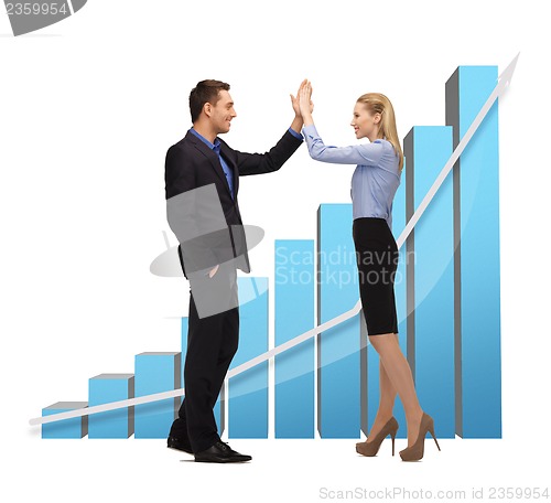 Image of man and woman giving a high five