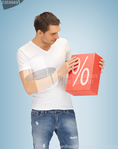 Image of man with big percent box