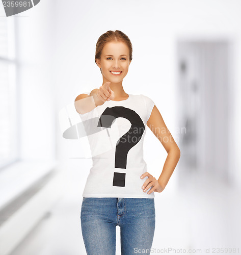 Image of woman in white t-shirt pointing at you