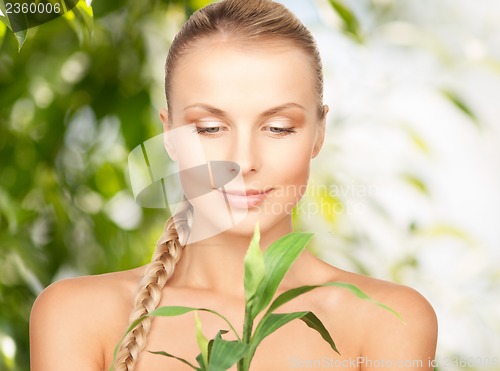 Image of woman with sprout
