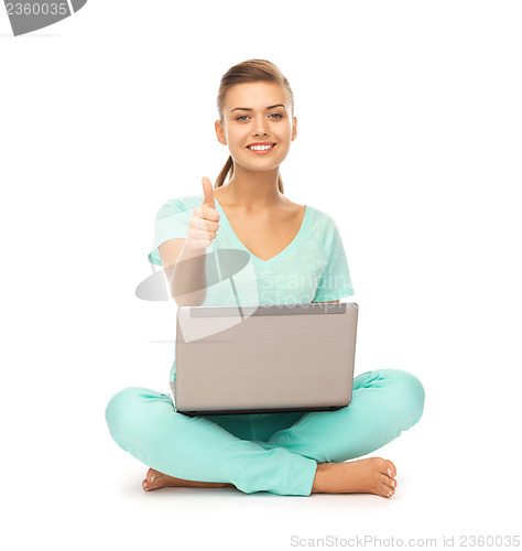 Image of girl with laptop showing thumbs up
