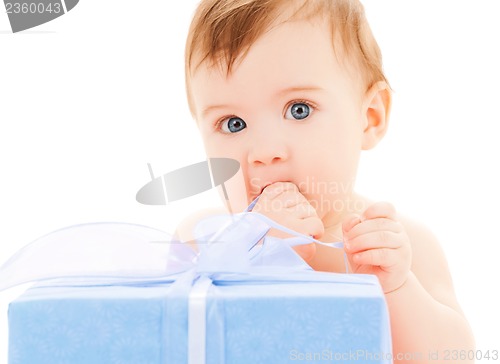 Image of happy child with gift box