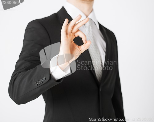 Image of man hands showing ok sign