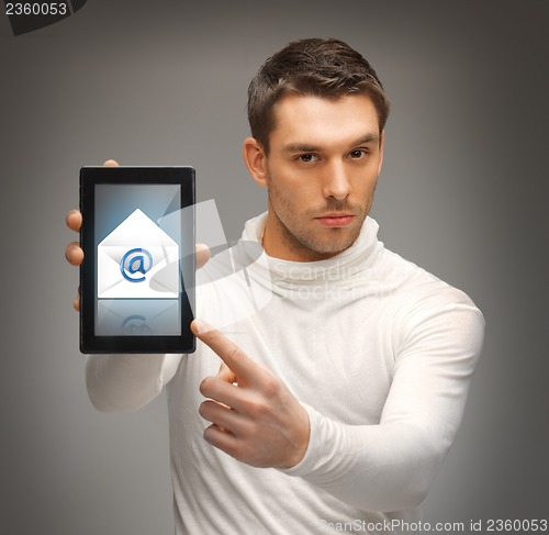 Image of man pointing at tablet pc with email icon