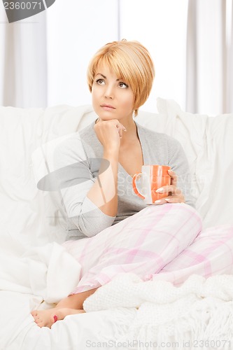 Image of woman with cup