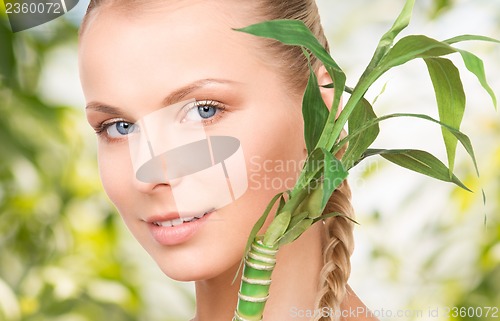 Image of woman with sprout