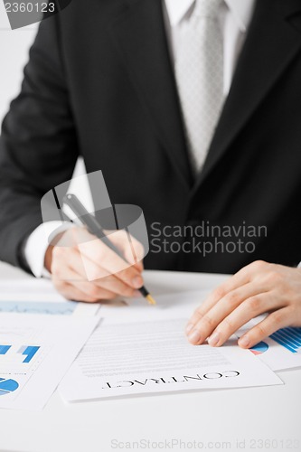 Image of man with contract