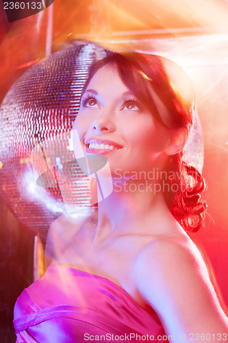 Image of woman with disco ball