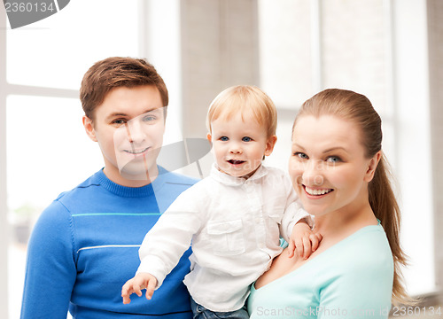 Image of happy family with adorable baby