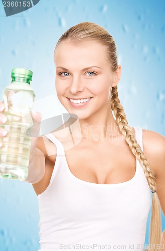 Image of beautiful woman with bottle of water