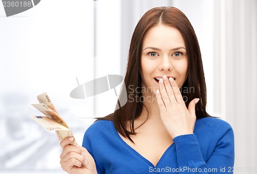 Image of lovely woman with euro cash money