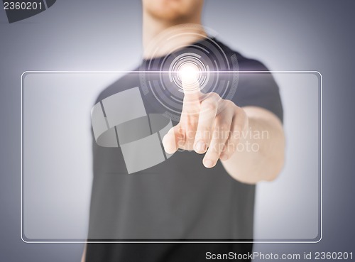 Image of male hand touching virtual screen