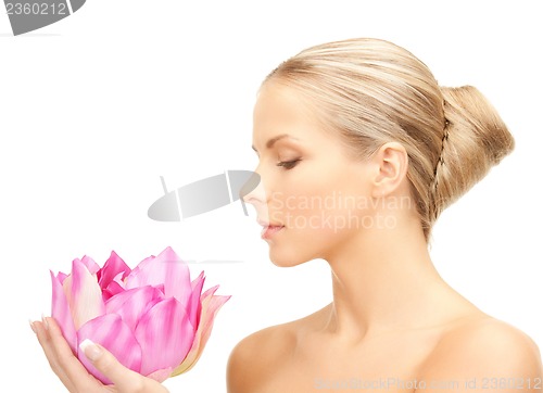 Image of lovely woman with lotos flower