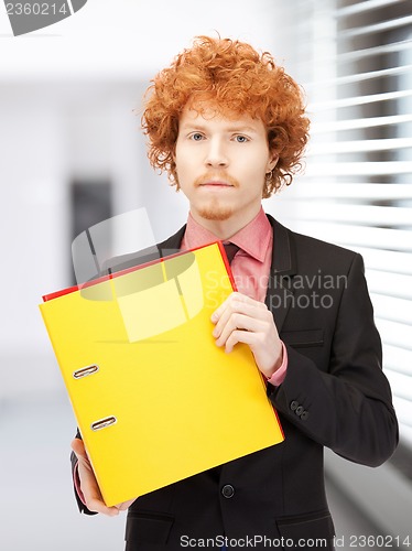 Image of man with folders