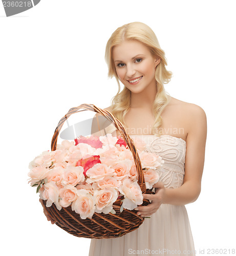 Image of woman with basket full of flowers