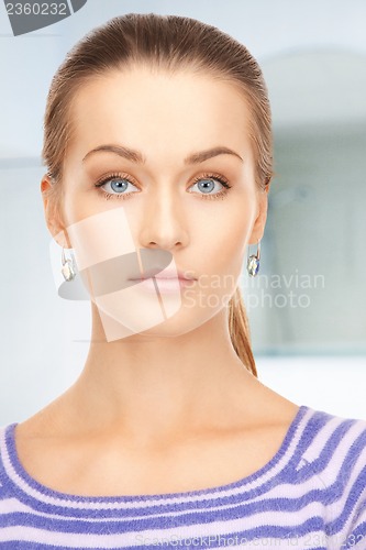 Image of lovely woman in striped sweater