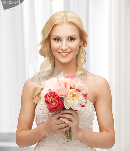 Image of woman with bouquet of flowers