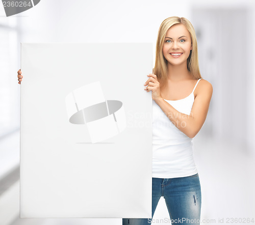 Image of woman with white blank board