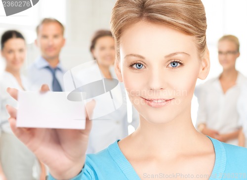 Image of woman with blank business or name card