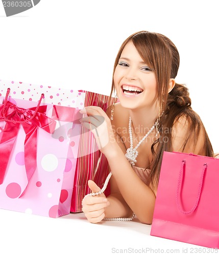 Image of girl with colorful gift bags