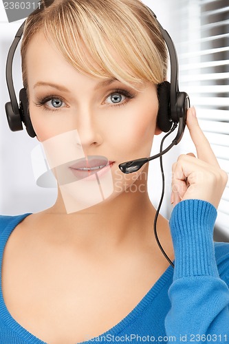 Image of friendly female helpline operator