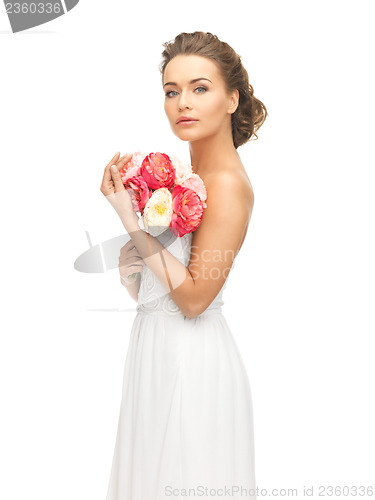 Image of woman with bouquet of flowers