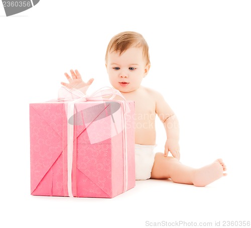 Image of happy child with gift box