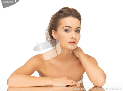 Image of woman with mirror