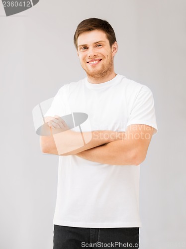 Image of smiling man in blank white t-shirt